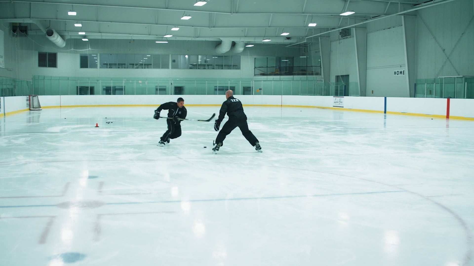 Sliding Pucks Through Defenders